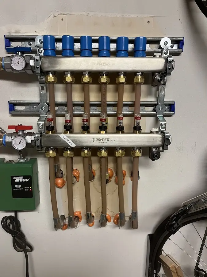 Plumber performing Water Heater Repair at a residential property in Starke